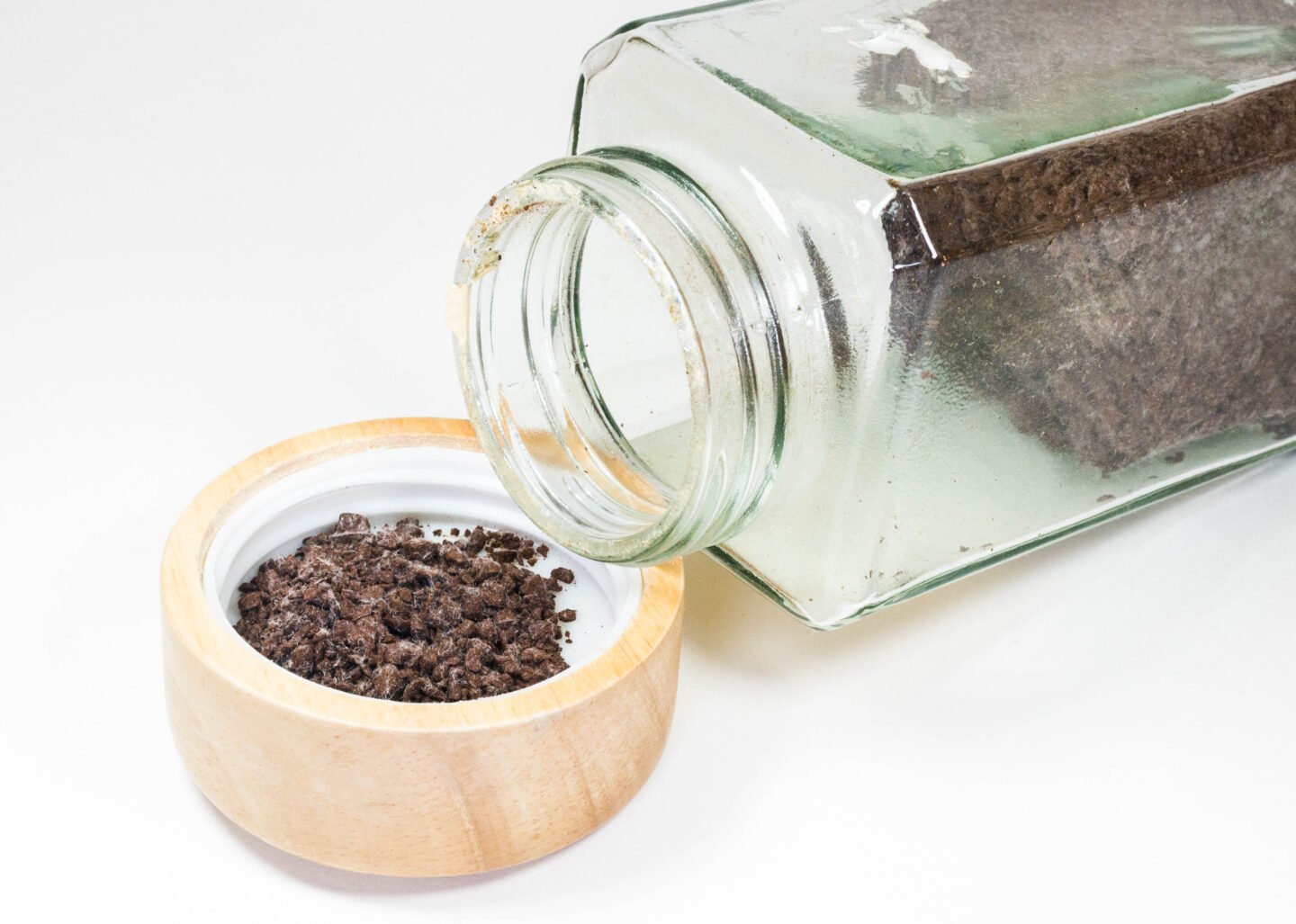 Expired,Coffee,Powder,In,The,Jar,With,Fungus,Background