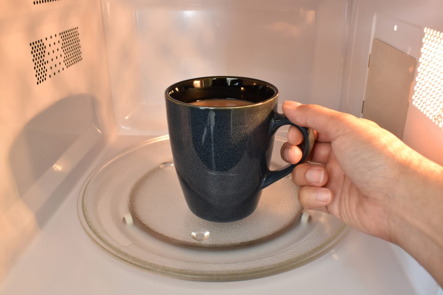 Cup,Of,Tea,Or,Coffee,In,Microwave.,Concept,Of,Heating