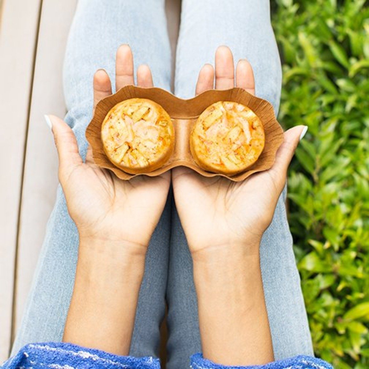 hands holding out starbucks egg bites in packaging 1