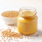 homemade dijon mustard sauce in a jar