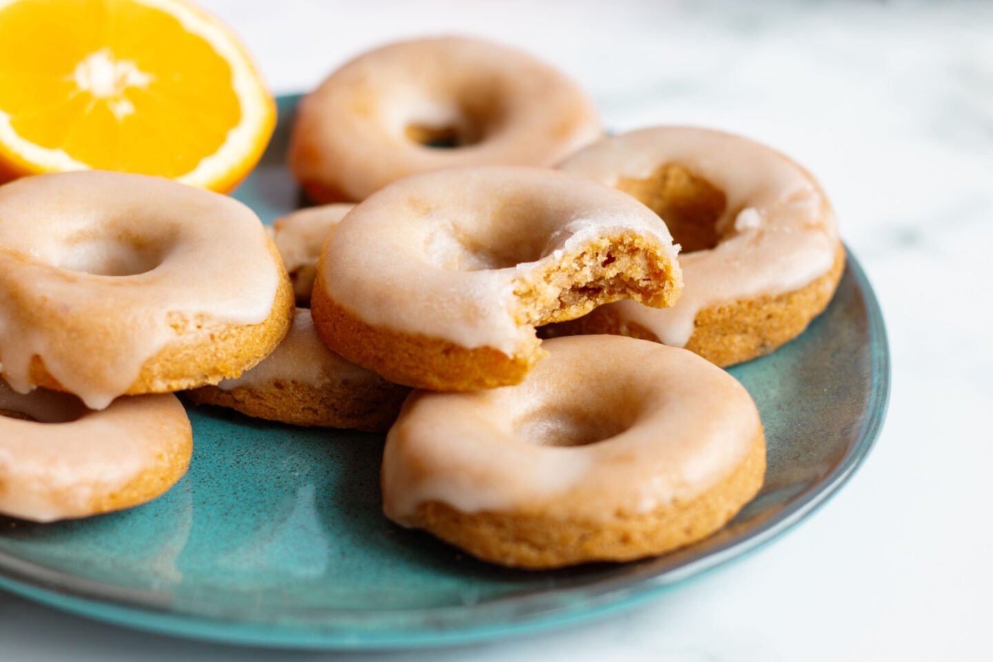 orange glazed vegan donuts