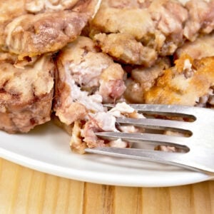 plate of fried brains with fork