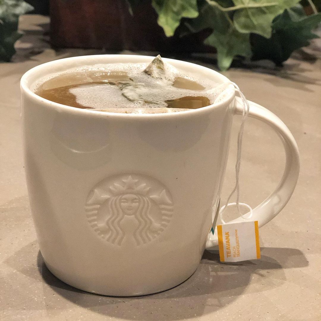 starbucks honey citrus mint tea or medicine ball or coldbuster in starbucks ceramic mug