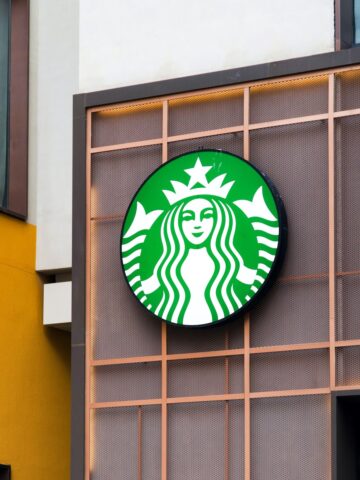 Starbucks Logo Affixed To Wall Of Starbucks Branch 360x480