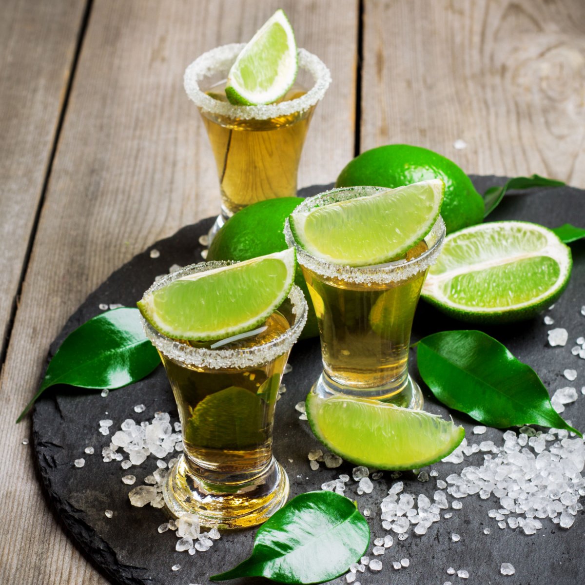 tequila shots with salt and lime slices