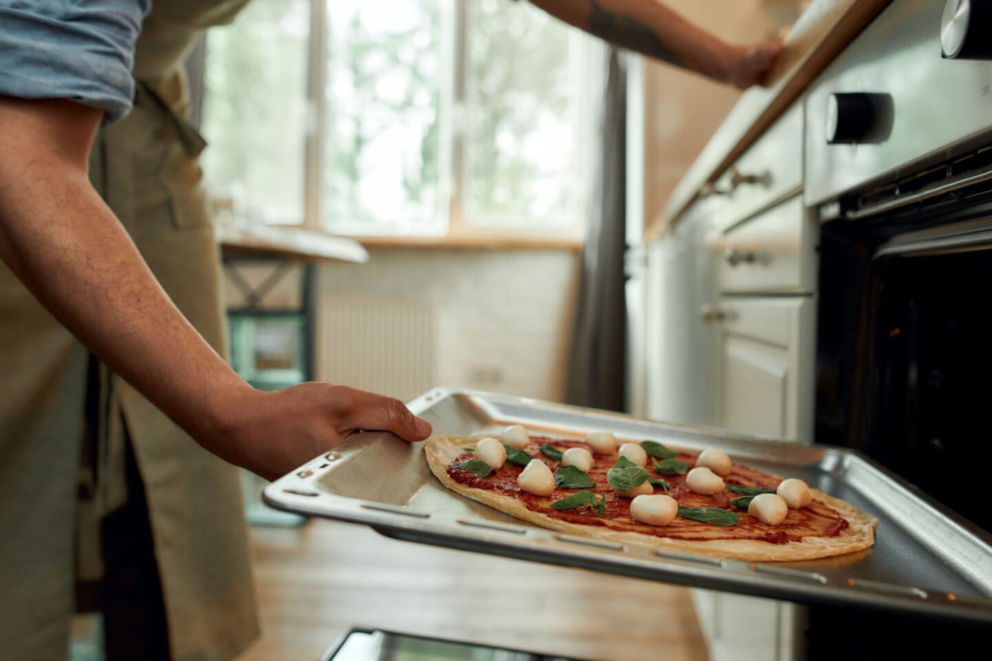 baking pizza in a modern oven