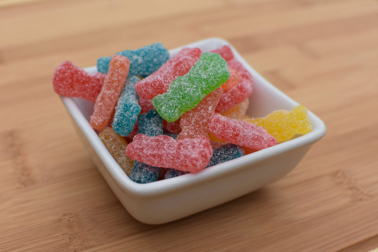 bowl of sour gummy candies