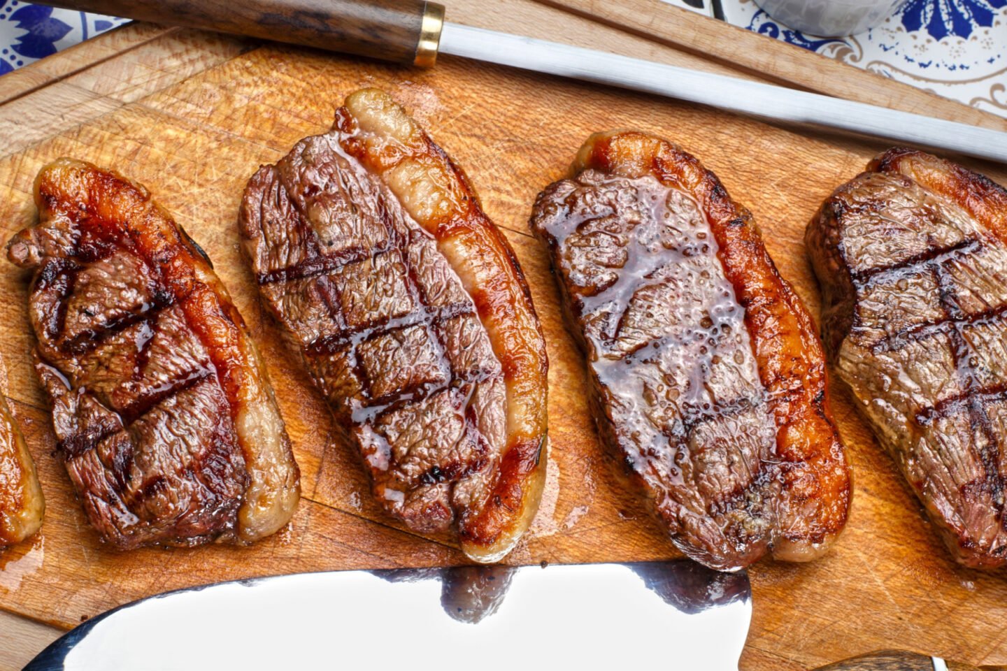 brazilian picanha steaks on a wooden board