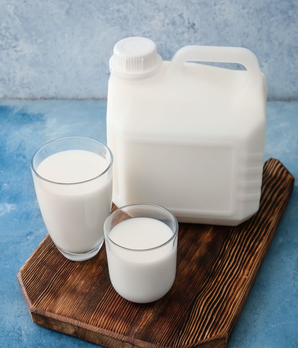 gallon of milk and drinking glasses