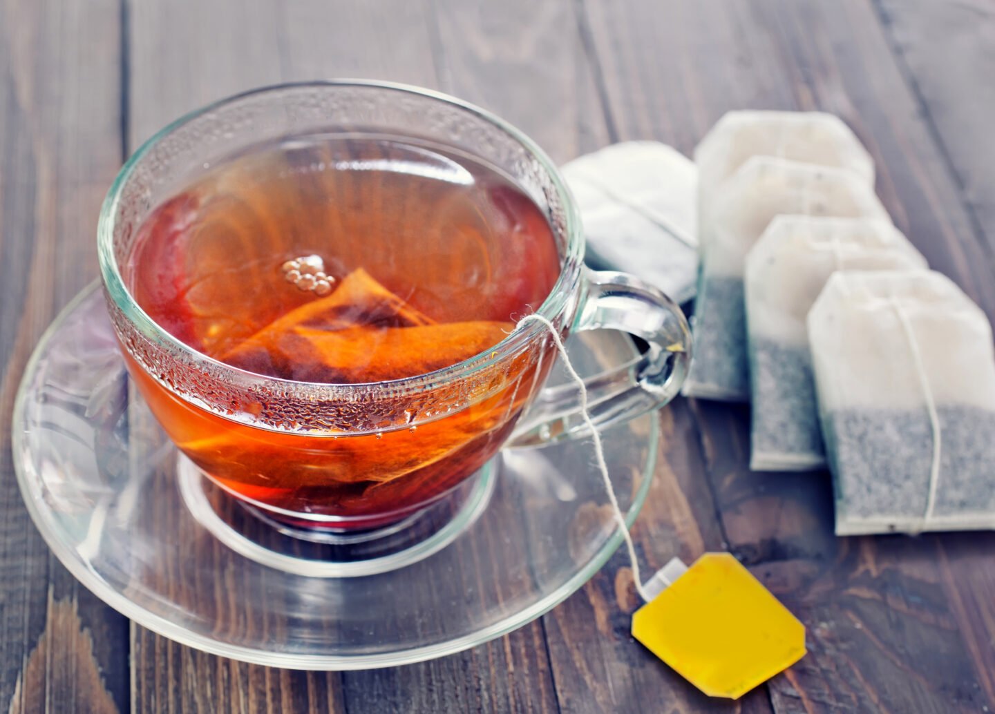 Tea,In,Glass,Cup,On,The,Wooden,Table