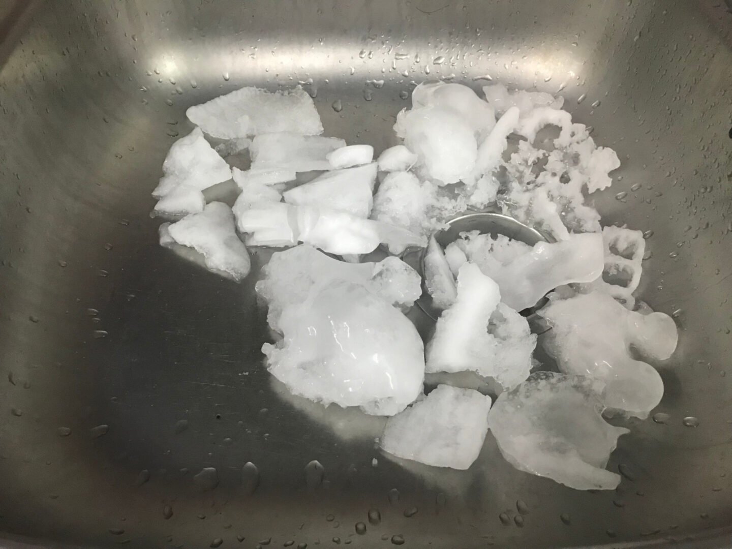 ice pieces in kitchen sink