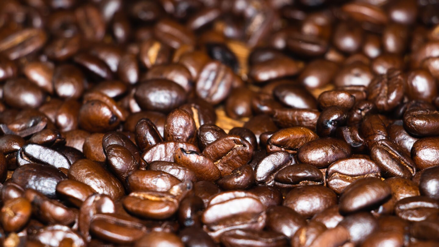 Close,Up,View,Of,Dark,Oily,Roasted,Coffee,Beans.,Exotic