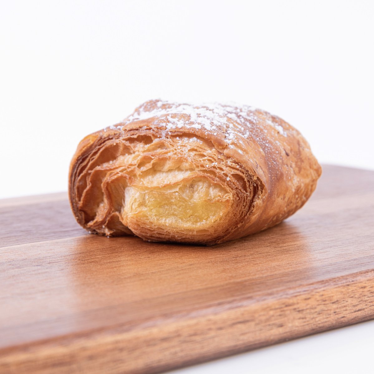 sugar puff pastry on a wooden board