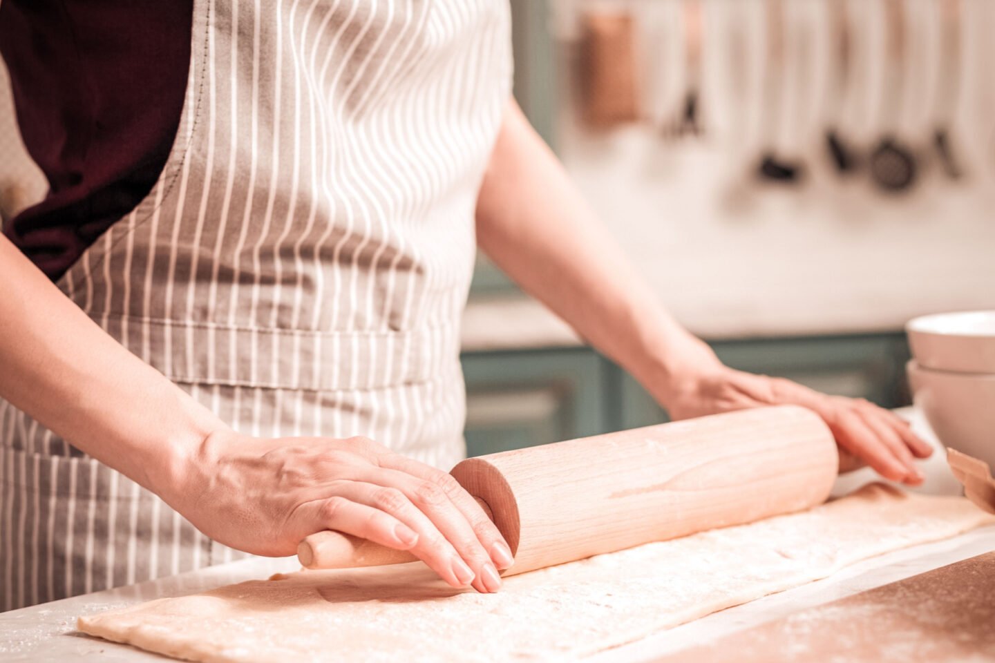 woman preparing pastry dough