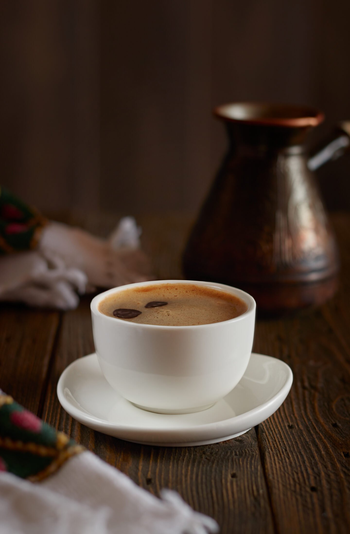 a-cup-of-coffee-on-a-wooden-table