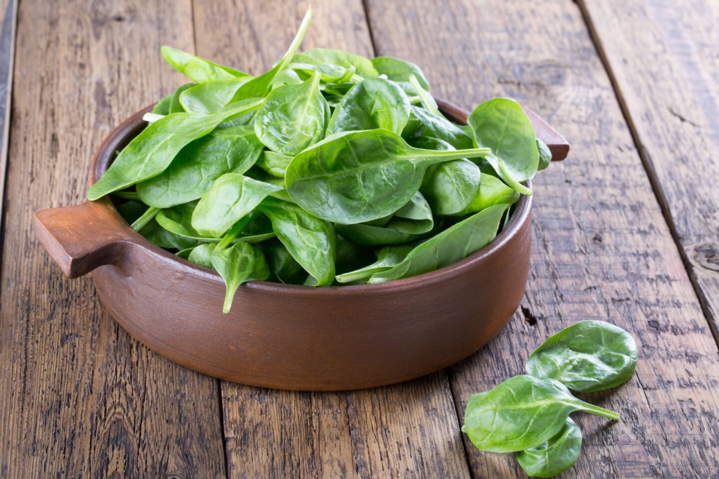 baby spinach leaves in a bowl