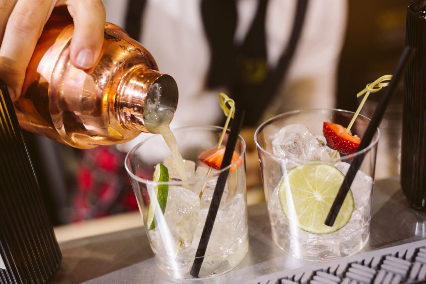 bartender mixing gin and tonic