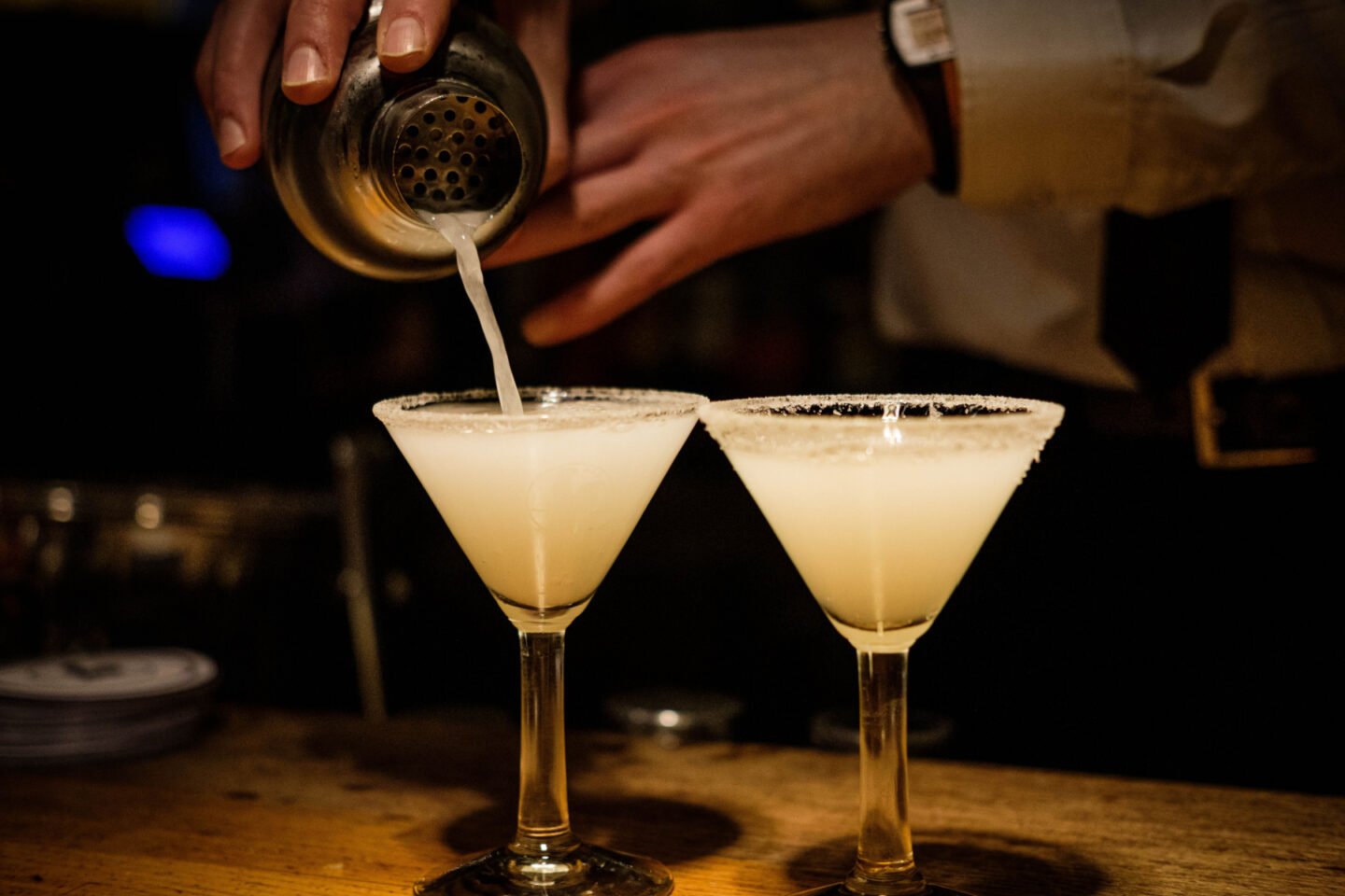 bartender mixing margaritas at a club