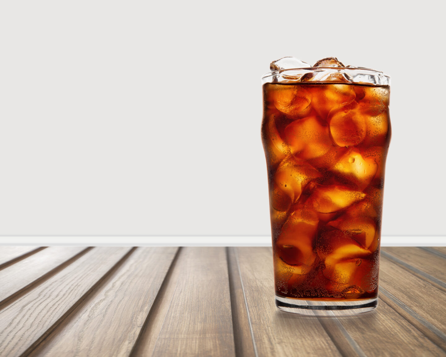 cold-brew-iced-coffee-in-a-clear-glass-cup-on-a- desk