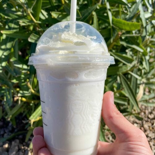 hand holding up starbucks cotton candy frapuccino