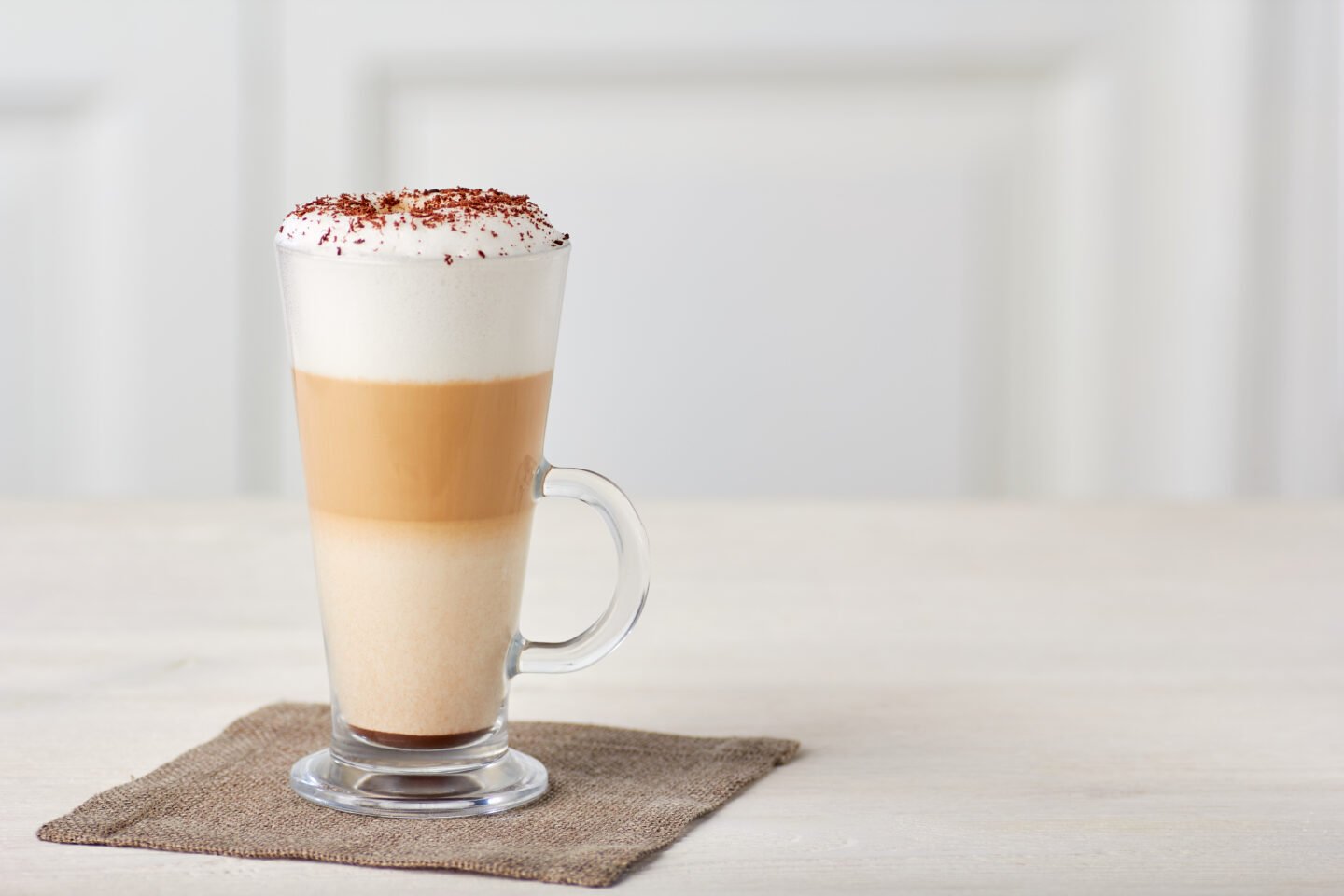 Glass,Cup,Of,Coffee,Latte,On,Wooden,Table