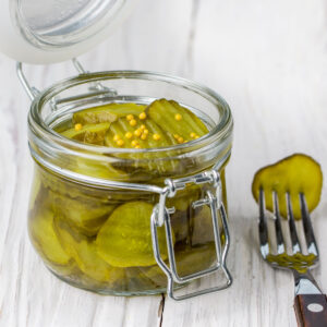 pickled cucumber slices in jar