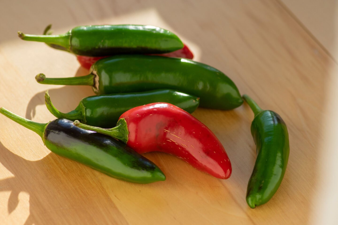 red and green jalapeno peppers