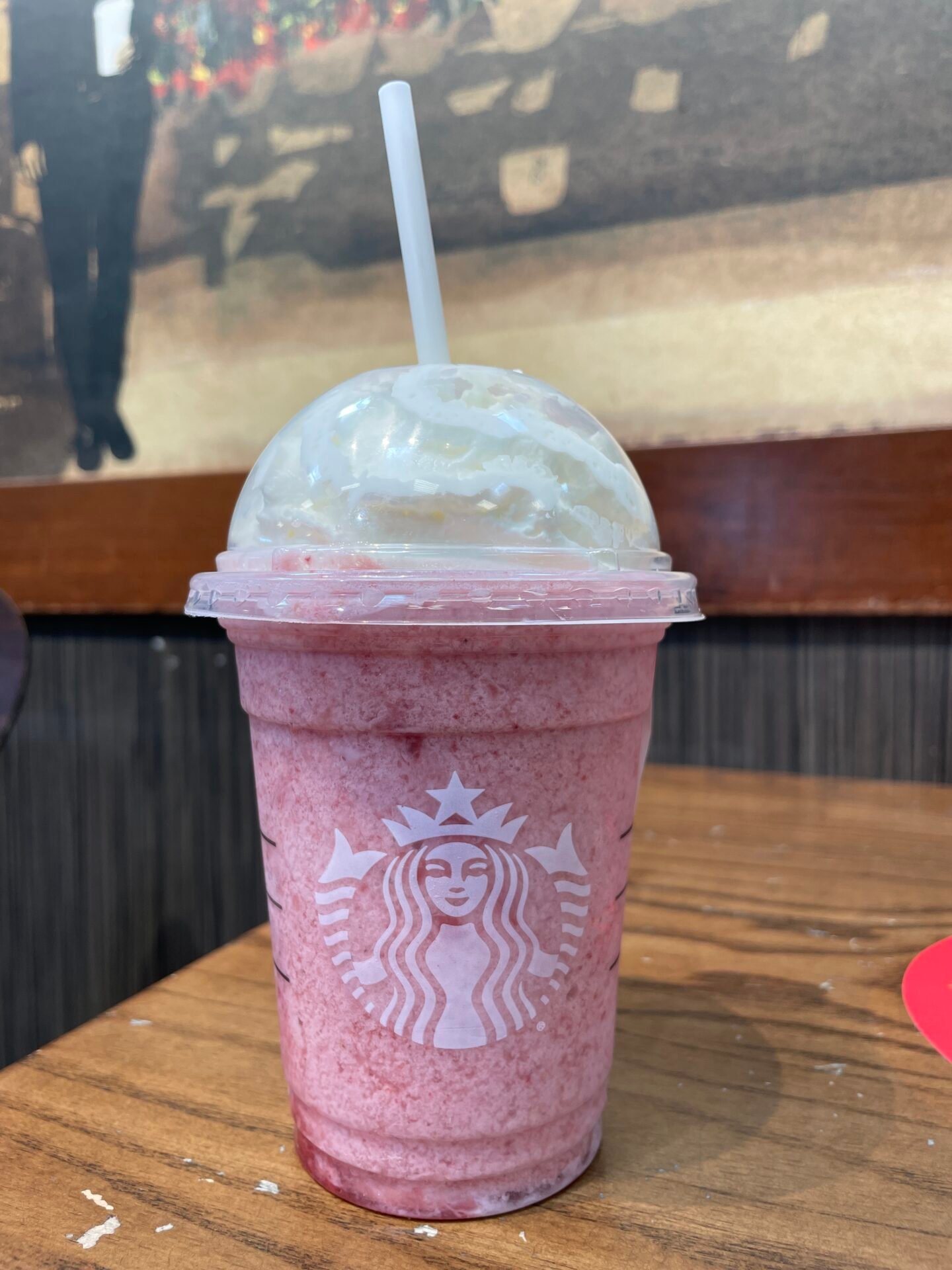 starbucks strawberry cheesecake frappuccino on wooden table