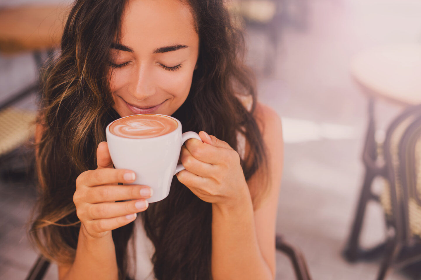 woman-holding-a-cup-of-coffee