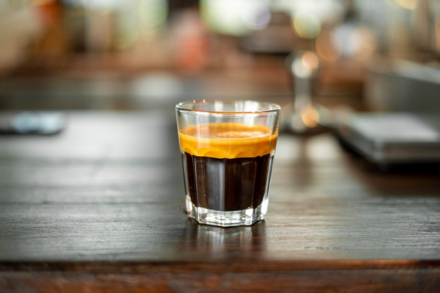 a-shot-of-espresso-on-a-wooden-table