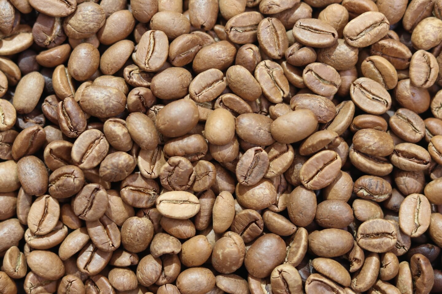 Light,Roasted,Coffee,Beans,Background.,Beverage,Concept,For,Wallpaper,,Backdrop