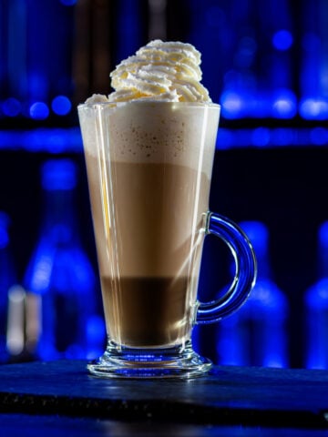 cocktail-layered-baileys-irish-cream-iced-coffee-on-bar-counter-in-a-restaurant