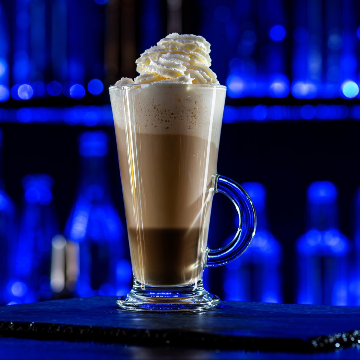 cocktail-layered-baileys-irish-cream-iced-coffee-on-bar-counter-in-a-restaurant