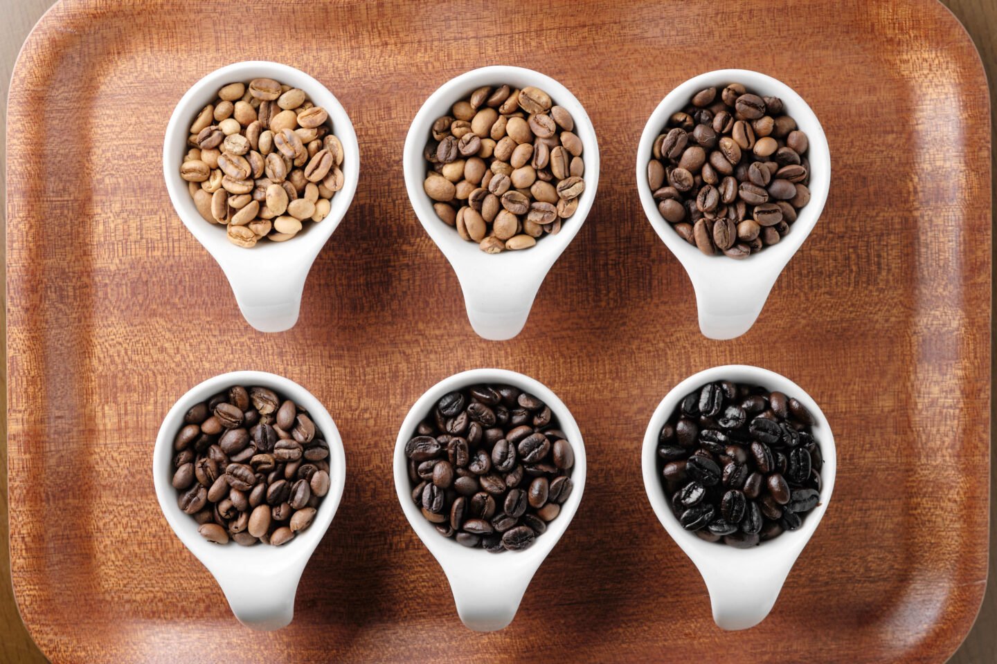 different-stages-of-coffee-beans-being-roasted