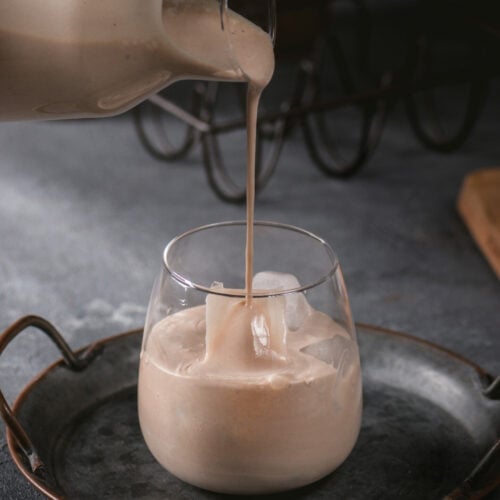 irish-cream-coffee-liqueur-with-ice-on-dark-background