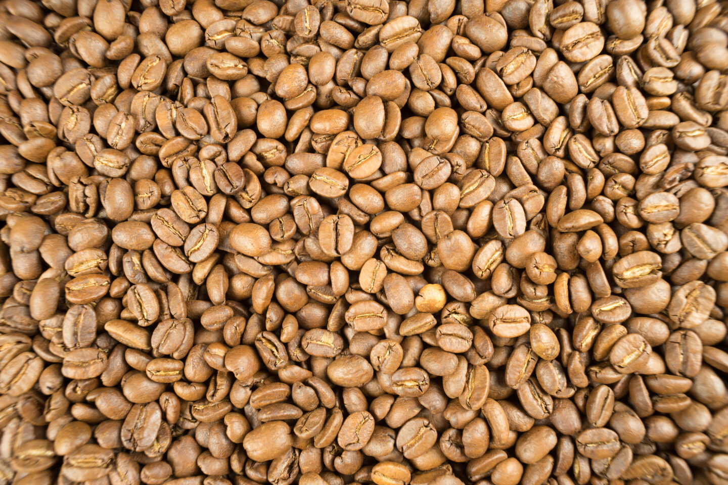Lightly,Roasted,Brown,Coffee,Beans.,Potential,Use,As,A,Background.