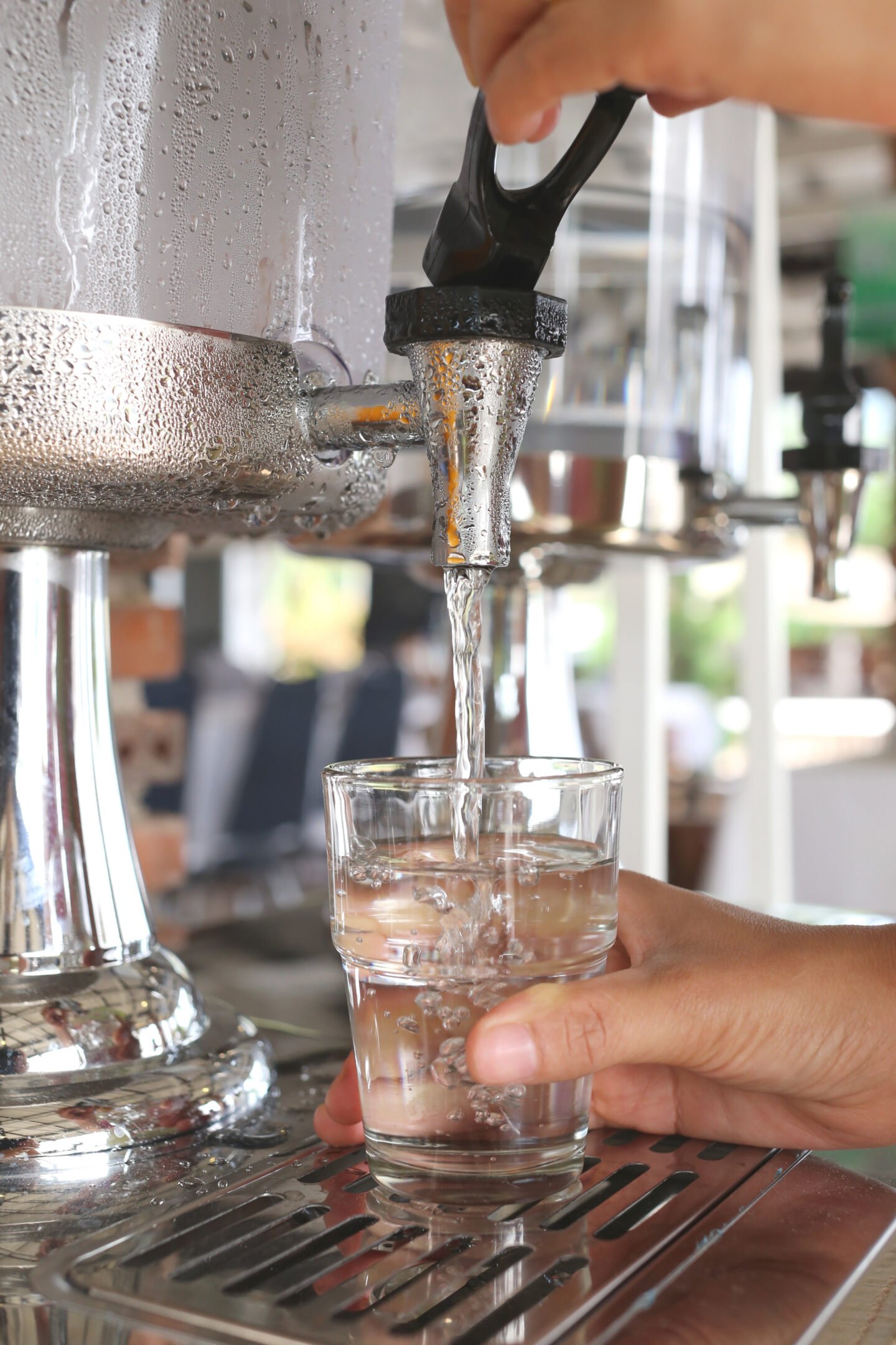 pouring-cool-water-in-a-cafe