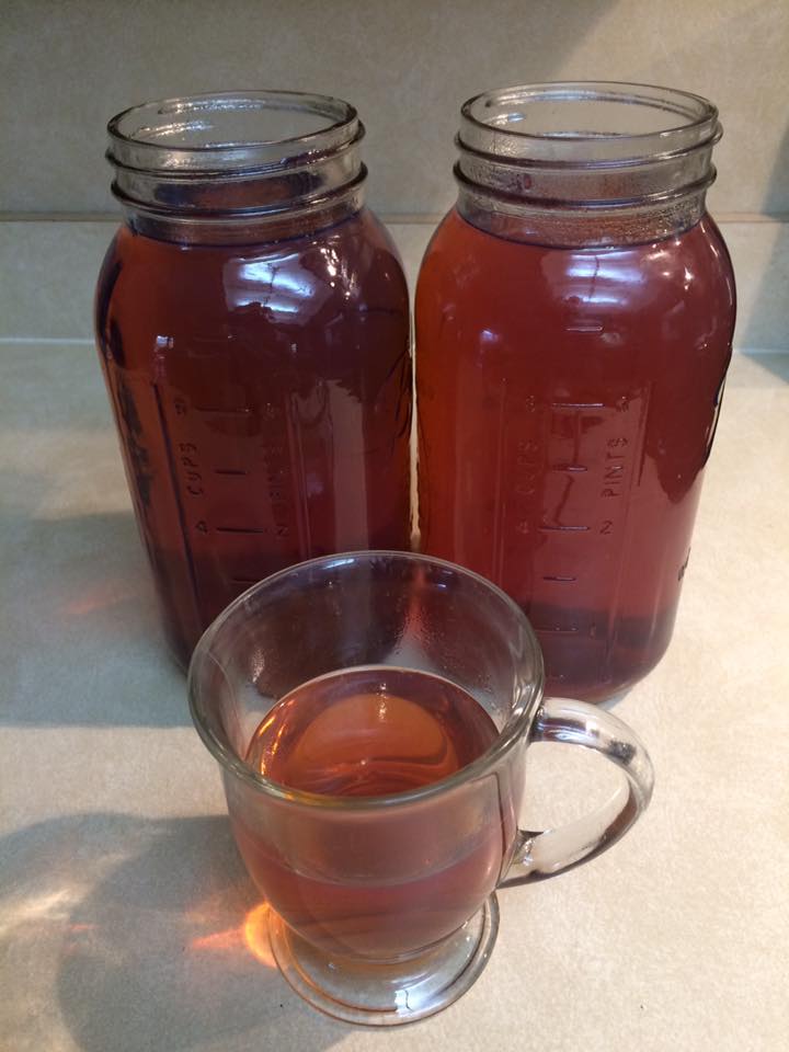 two jars and a cup of palo azul tea