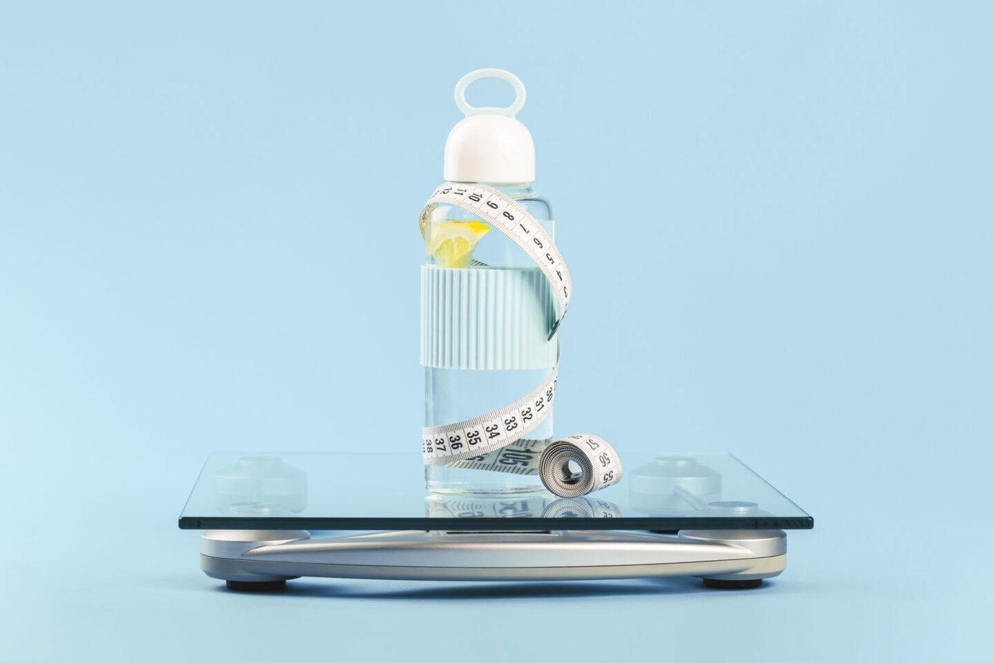 bottle of lemon water on a weighing scale