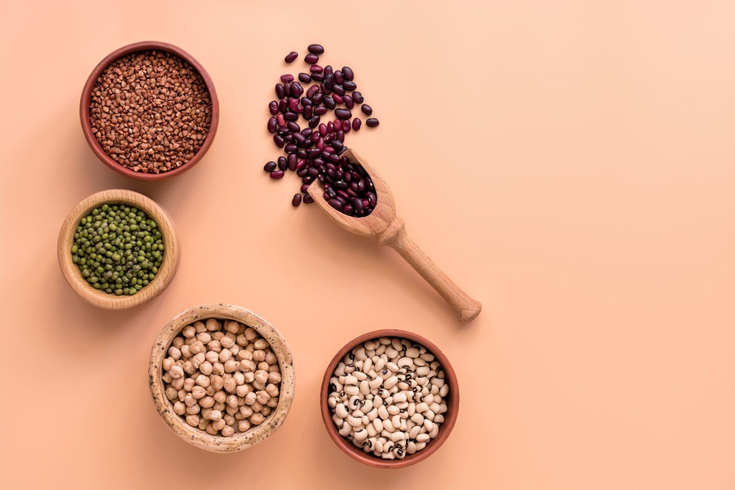 bowls of different beans and legumes