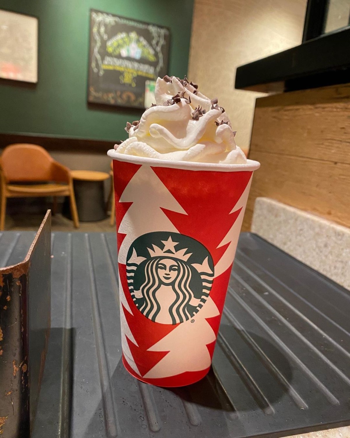 cup of warm peppermint hot chocolate on table