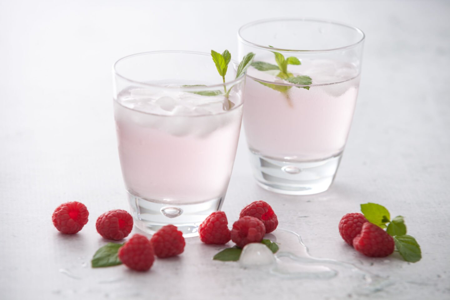 glasses of raspberry flavored water