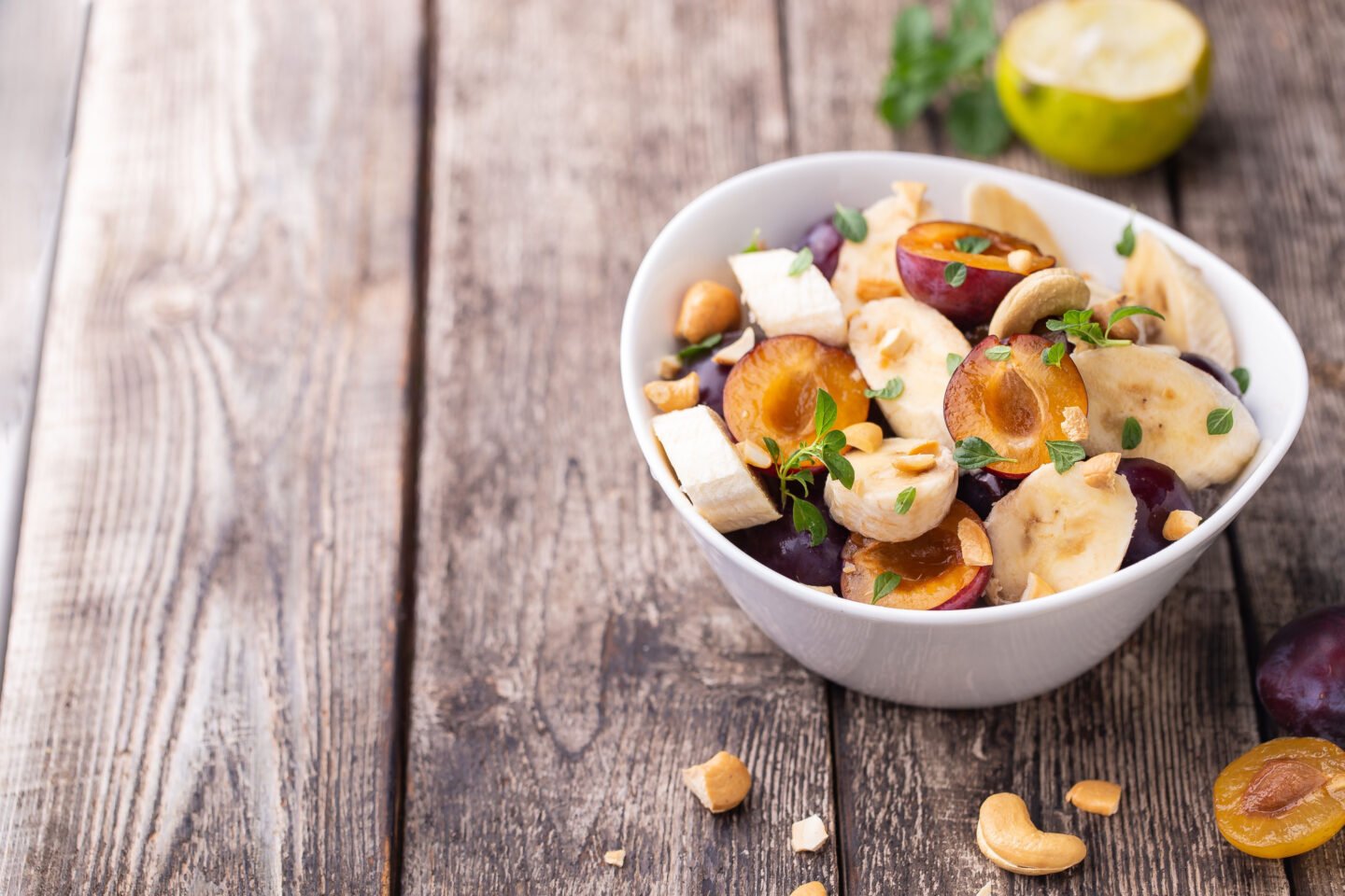 plum banana salad with lime dressing and cashew