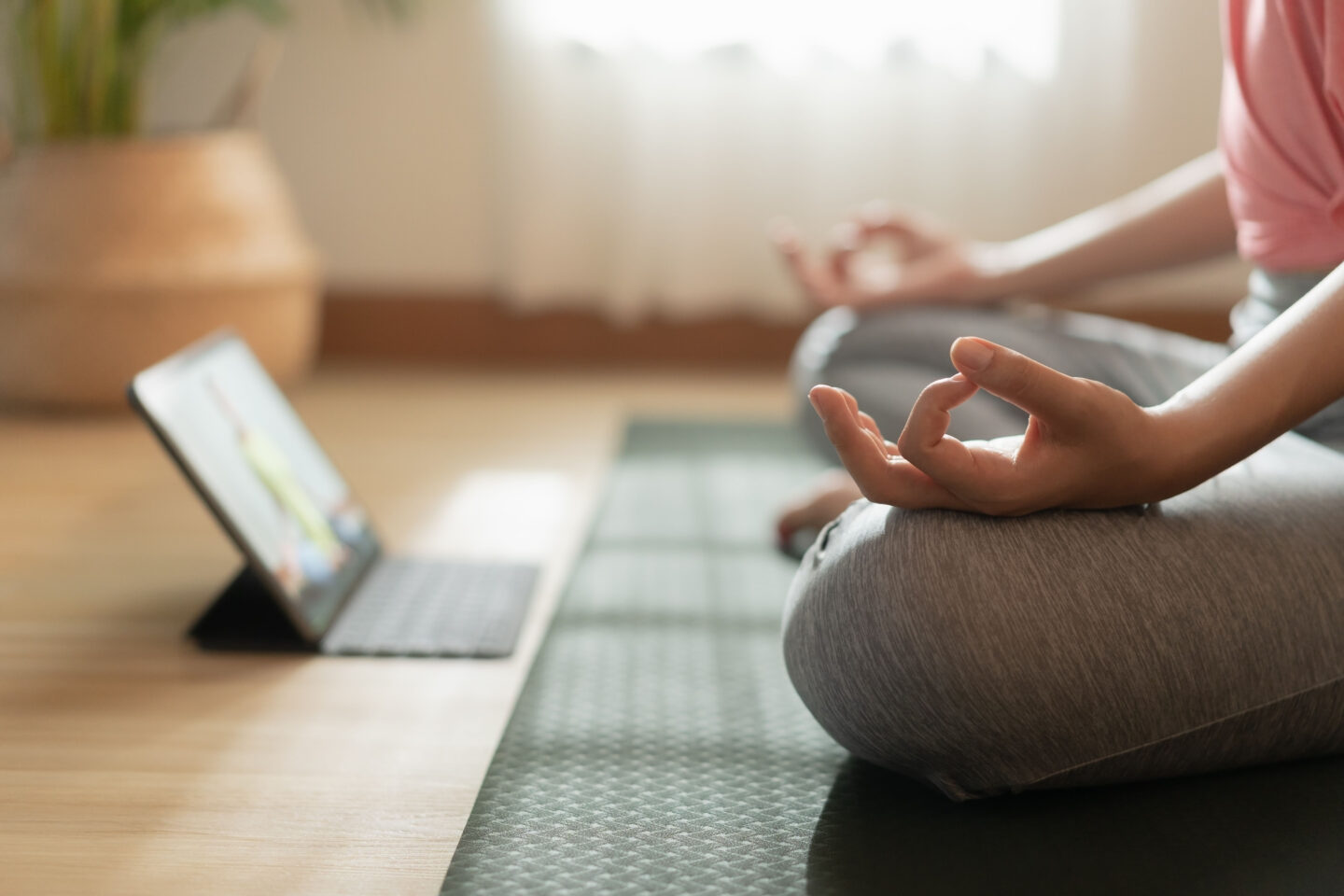 woman doing yoga at home