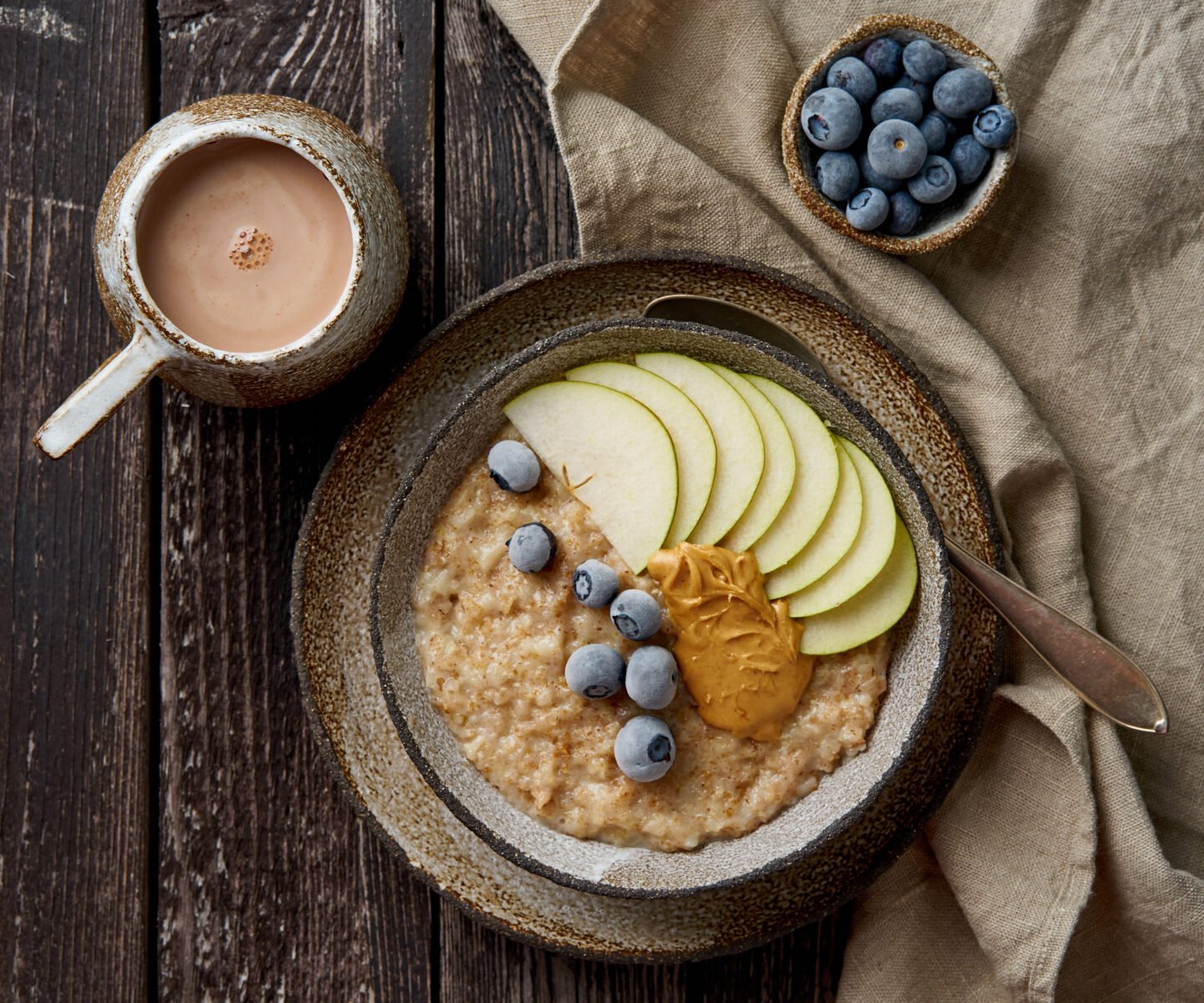 oatmeal porridge in large bowl with fruits