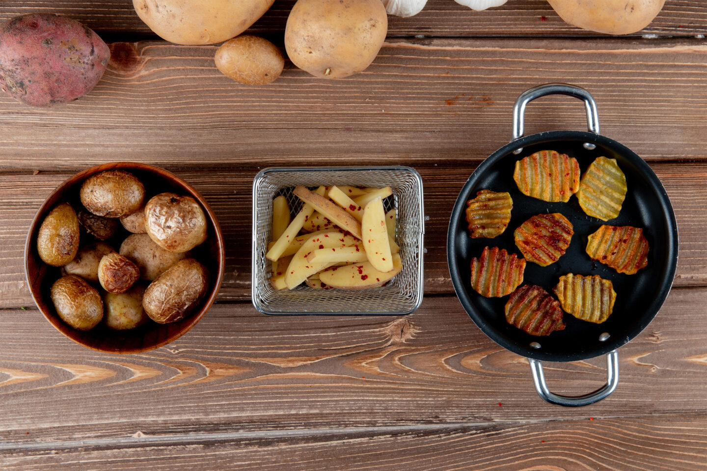 top view of baked sliced potato with potato chips