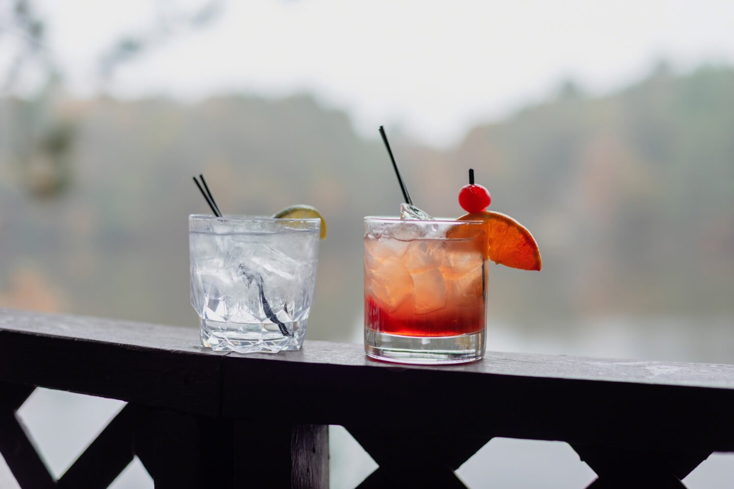 two cocktails on the railing