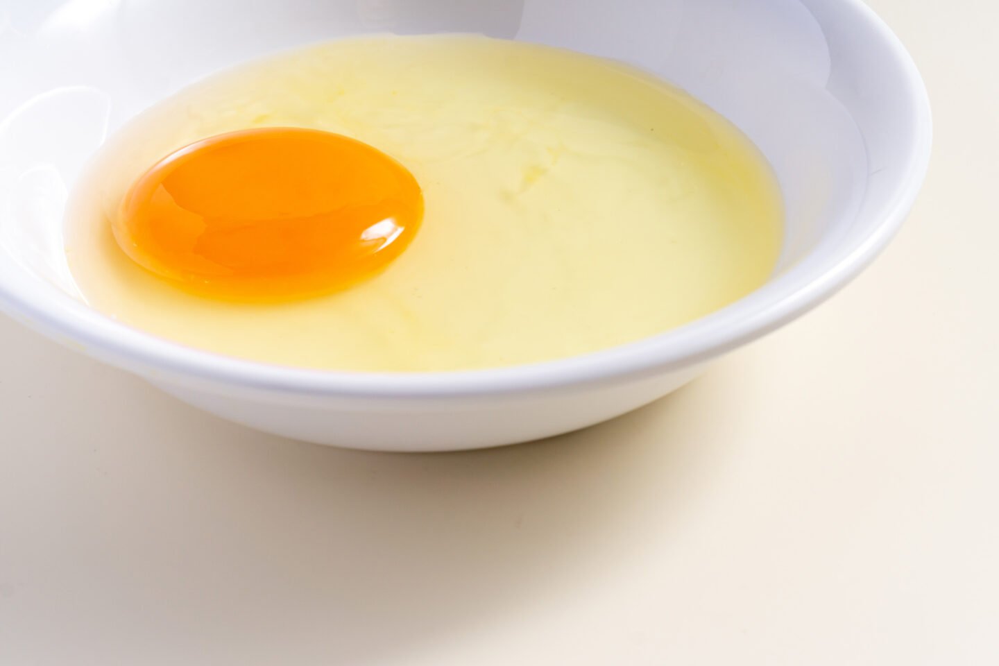 raw egg yolk in bowl