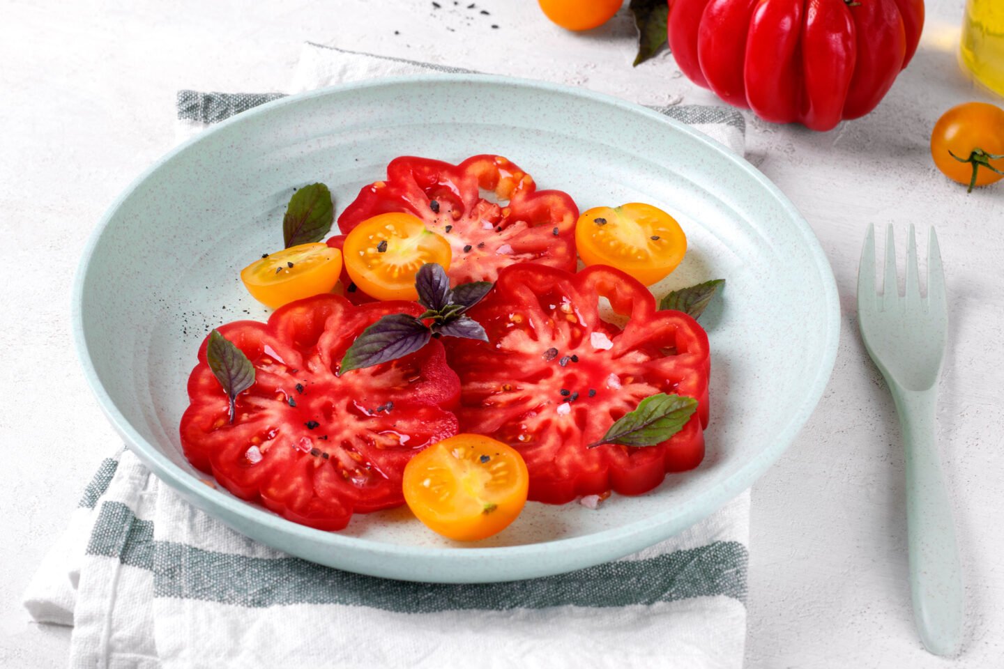tomato salad with red ridged beefsteak variety