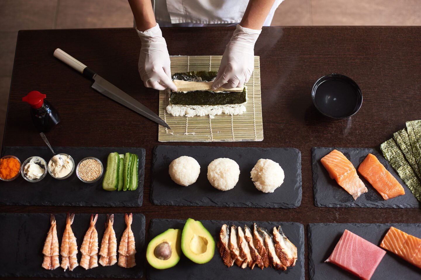 process of preparing rolling sushi